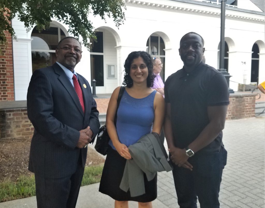 From left to right- Robert Barnette, Hanover NAACP President; Azadeh Erfani, of WLC; Cyril Djoukeng, of Covington and Burling