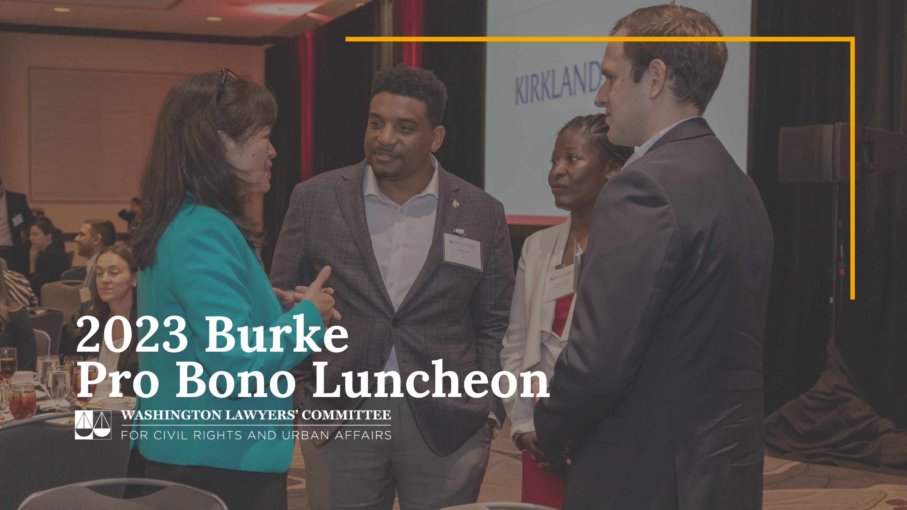 Photo of a group of people chatting including Joanne Lin, Executive Director, at the 2023 Branton Luncheon. Overlaying white text reads "2023 Burke Pro Bono Luncheon" and a white Washington Lawyers' Committee logo