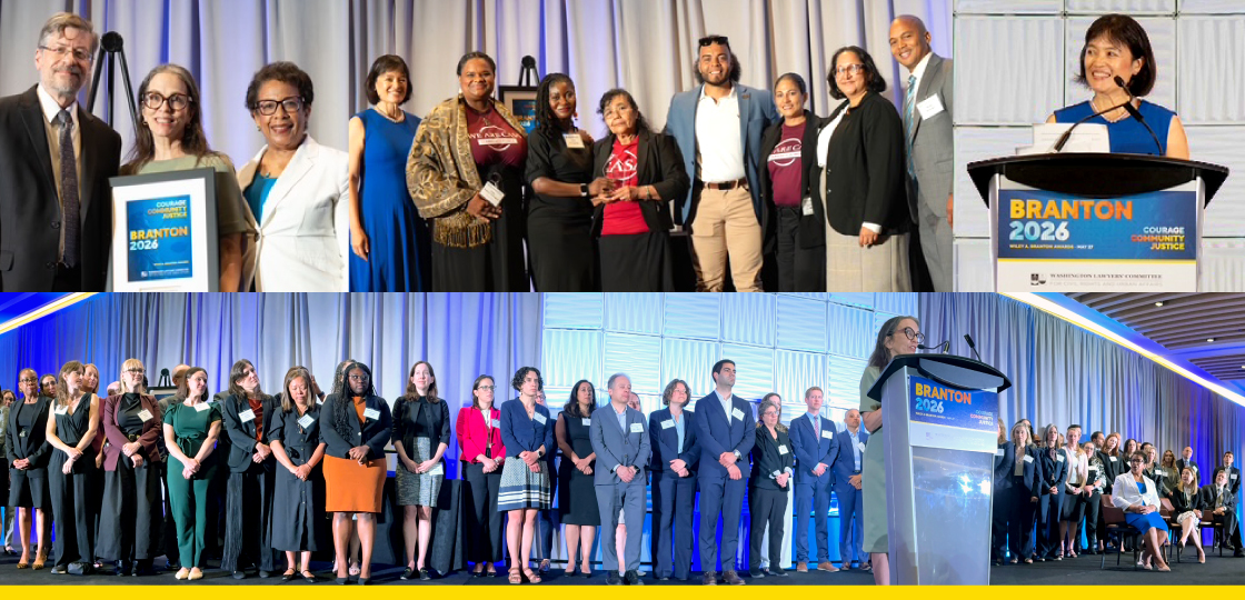 A group of people in business attire stand on stage at an event, with some seen receiving an award and others lined up behind a podium with a Branton 2026 sign.